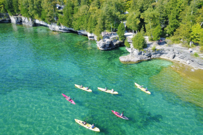 Door County coastline with kayaks in water