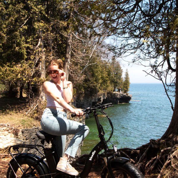 a person riding a motorcycle posing for the camera